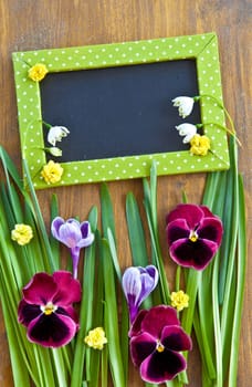 Colourful frugal flowers and grasses on a rustic wooden background