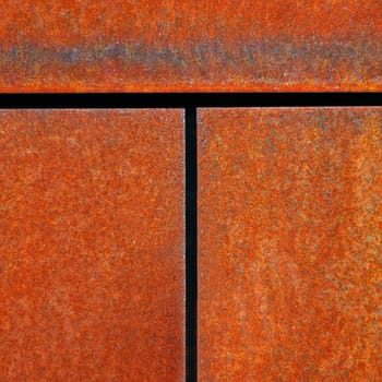 Fugue of metal plates on a facade
