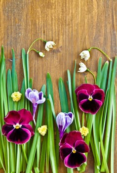 Colourful frugal flowers and grasses on a rustic wooden background
