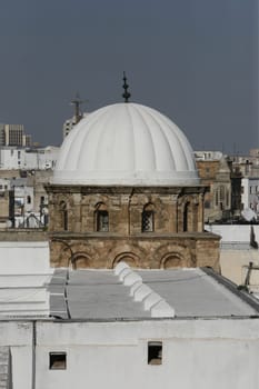 The dome of the Grand Mosque in the Old Town or Medina of the capital Tunis in the north of Tunisia in North Africa on the Mediterranean Sea.