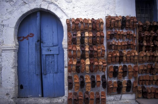 Shoes on the Souq or market in the old town or medina of Sousse on the Mediterranean Sea in Tunisia in North Africa.