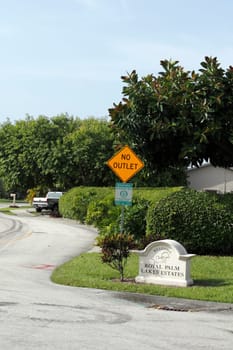 OAKLAND PARK, FLORIDA - JULY 1, 2013: Entrance welcome sign of the relaxing suburban neighborhood of Royal Palm Lake Estates. 105 homes are in this residential subdivision located in Broward County.