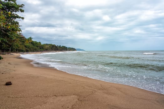 Overcast Caribbean beach in the town of Palomino in Colombia
