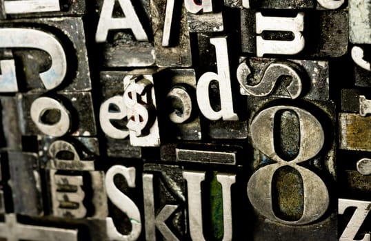 Old metal blank printing press typeset all stacked up