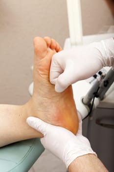 Women's feet are massaged by foot caregivers