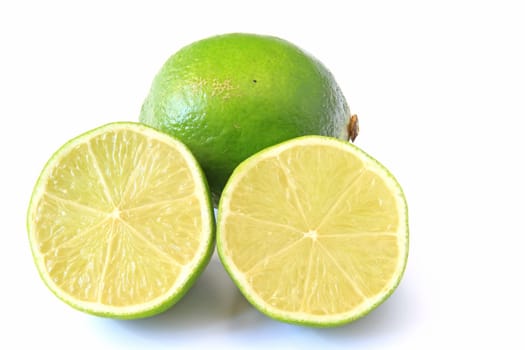 Lime,whole and halved fruit