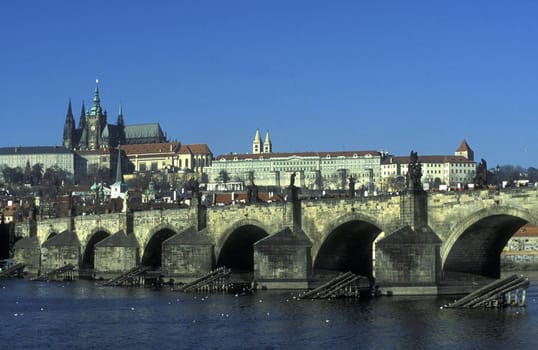The Karlsbruecke above the Vltava River in the capital Prague in the Czech Republic Repubilck in Eastern Europe.