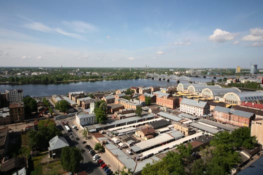 The district of Small Moscow on the Daugava River with the market and market halls of Riga from the view of the view terrace of the Socialist High-Rise Academy of Sciences in the district of Little Moskov in Riga,Latvia