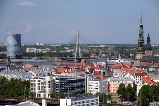 The Old Town with the Vansu Bruecke and the Cathedral as well as the River Daugava from the view of the view of the Socialist High-Rise Academy of Sciences in the district of Little Moskow in Riga,Latvia