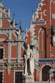 The St. Peter's Church and the Black House in the Old Town of Riga,the main city of Latvia in the BalticS in Eastern Europe.