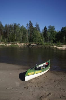 Canoeing on the river Gauja in Sigulad oestlich from Riga the capital of Latvia in the Baltics in Eastern Europe.