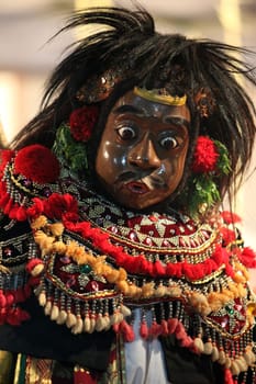 A traditional mask during a traditional dance on the island of Nusa Lembongan on the neighbouring island of Bali,Indonesia.