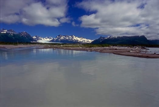 Copper River with mountains in  Alaska