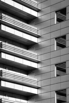 Photographing modern balconies on a high-rise building.