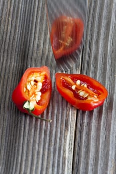 Two halves of a spicy Habanero chili pepper