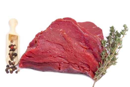 Beef fillet with thyme branch and peffer grains