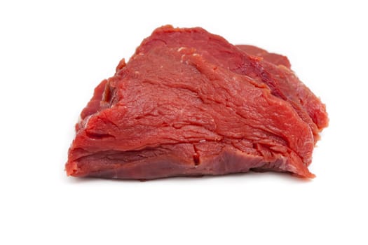 Piece of beef fillet isolated against a white background