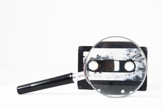 Ancient Vintage Used Musicassette over a White Background