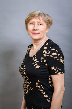 older adult woman seniorwith grey hair and wrinkle swelling healthy portrait in front of gauem background