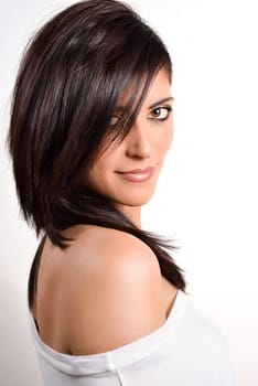 Portrait of a beautiful caucasian woman on a white background
