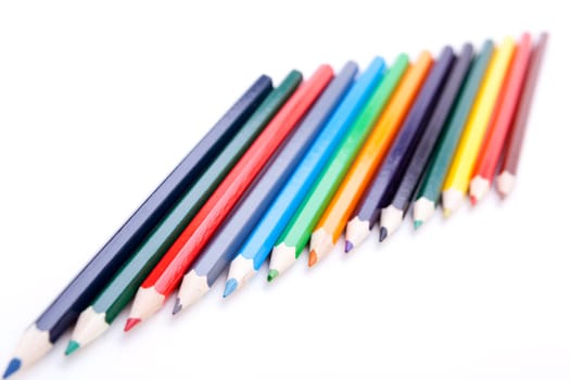 Colored pencils pencils in different colors resharpened insulated on white background