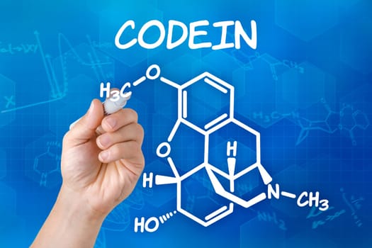 Hand draws chemical structural formula of codeine