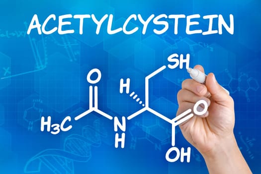 Hand draws chemical structural formula of acetylcysteine