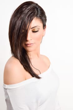 Portrait of a beautiful caucasian woman on a white background