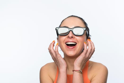 Portrait of beautiful caucasian woman wearing large 3D cinema glasses and smiling
