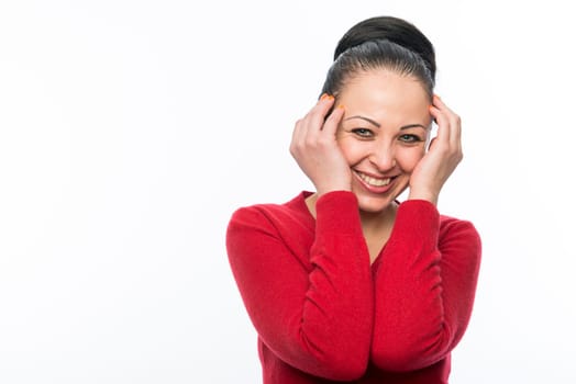 Portrait of beautiful caucasian woman wearing red dress and smiling