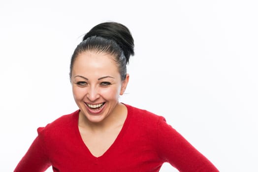 Portrait of beautiful caucasian woman wearing red dress and laughing