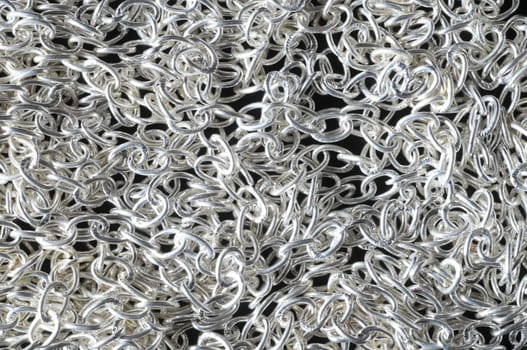 Silver Small Chain Texture on a Black Background