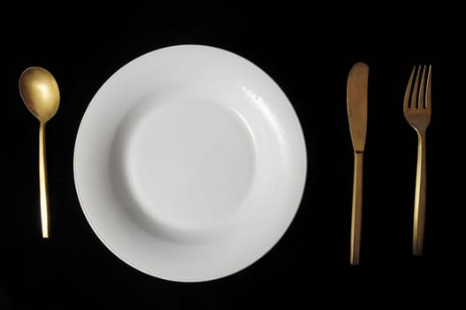 Ancient Vintage Silver Flatware on a Black Background