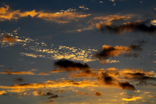 Cloudscape, Colored Clouds at Sunset near the Ocean