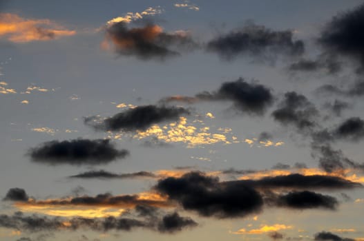 Cloudscape, Colored Clouds at Sunset near the Ocean
