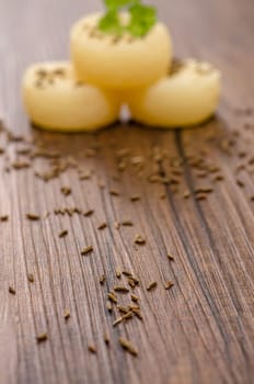 Caraway on wood with Harz cheese in the background