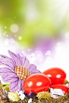 Easter eggs in basket on colorful bokeh background