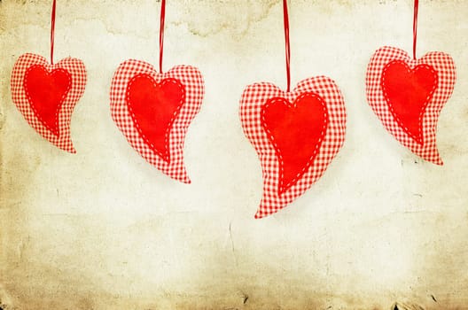 Vintage decoration Red hearts on paper background