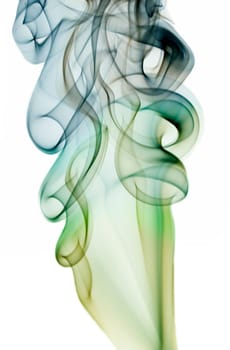 Close up on abstract colored smoke isolated on white background
