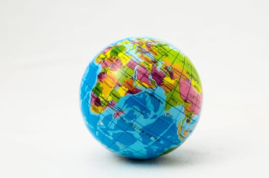The World Globe Made of Rubber on a White Background