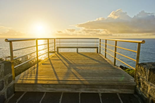 HDR Picture Sunrise on a Pier over Atlantic Ocean in Tenerife Canary Islands Spain