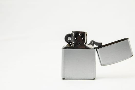 Vintage Zippo Style Lighter On a White Background