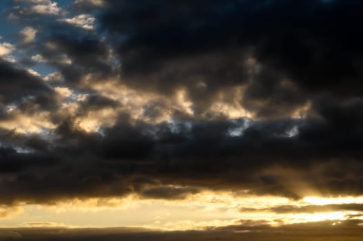 Cloudscape, Colored Clouds at Sunset near the Ocean