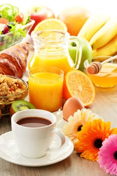 Breakfast with coffee, juice, croissant, salad, muesli and egg. Swedish buffet
