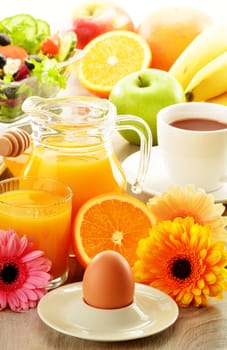 Breakfast with coffee, juice, croissant, salad, muesli and egg. Swedish buffet