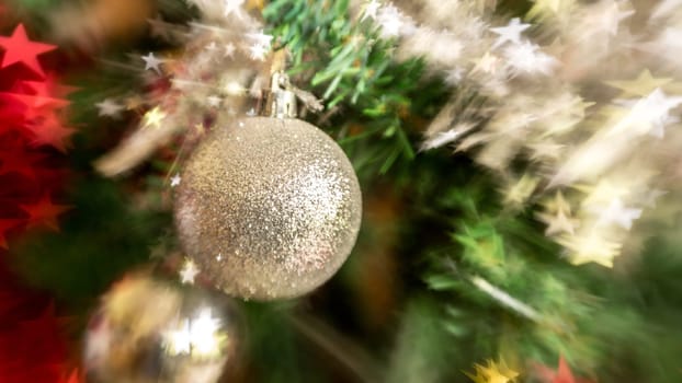 A shiny silver colored sparkling christmas ball
