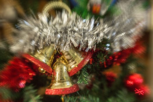 A closeup shot of a christmas tree decoration with different kind of ornaments