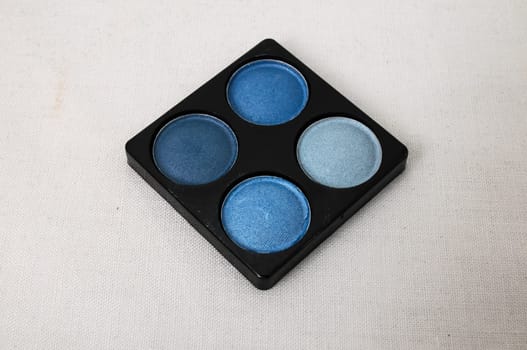 Make-up Palette Of Colorfully Eyeshadows Over White Background