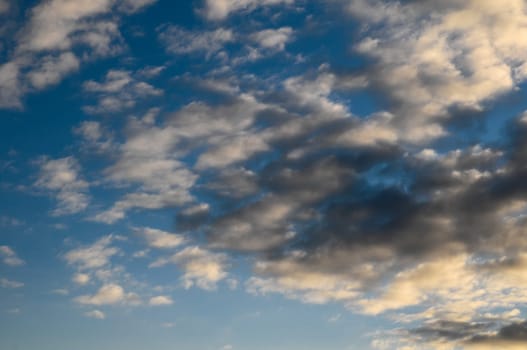 Cloudscape, Colored Clouds at Sunset near the Ocean
