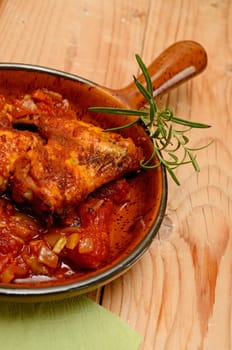 Spicy Italian chicken in a traditional ceramic pan